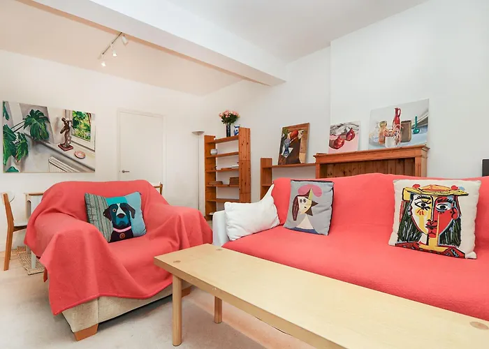 Elegant 2-Bedroom Getaway W Terrace & Garden Views