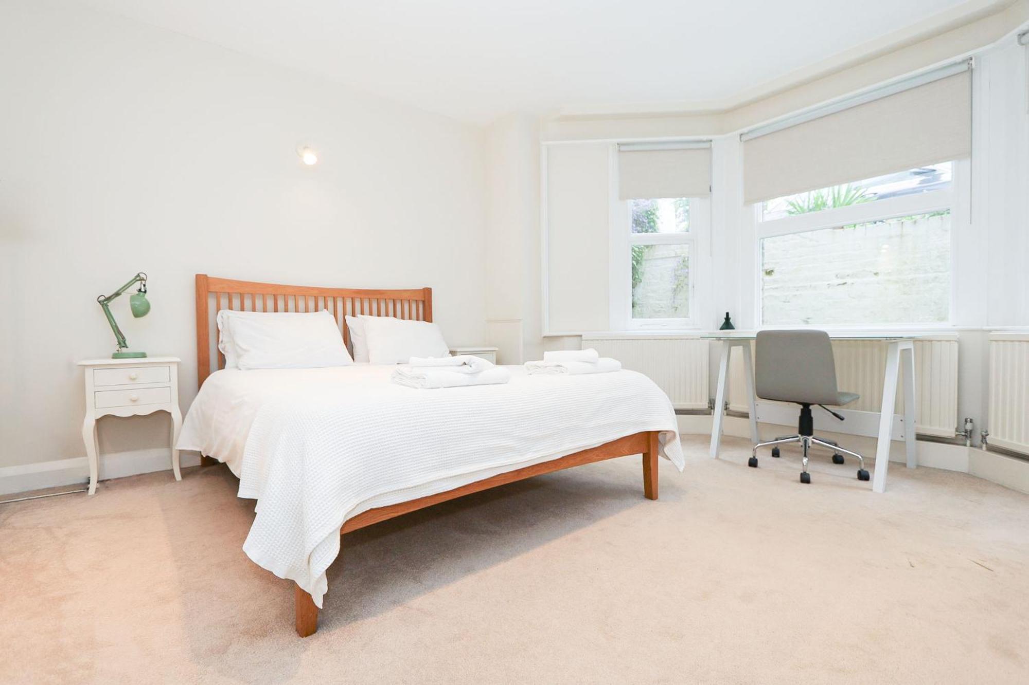 Elegant 2-bedroom Getaway W Terrace & Garden Views *