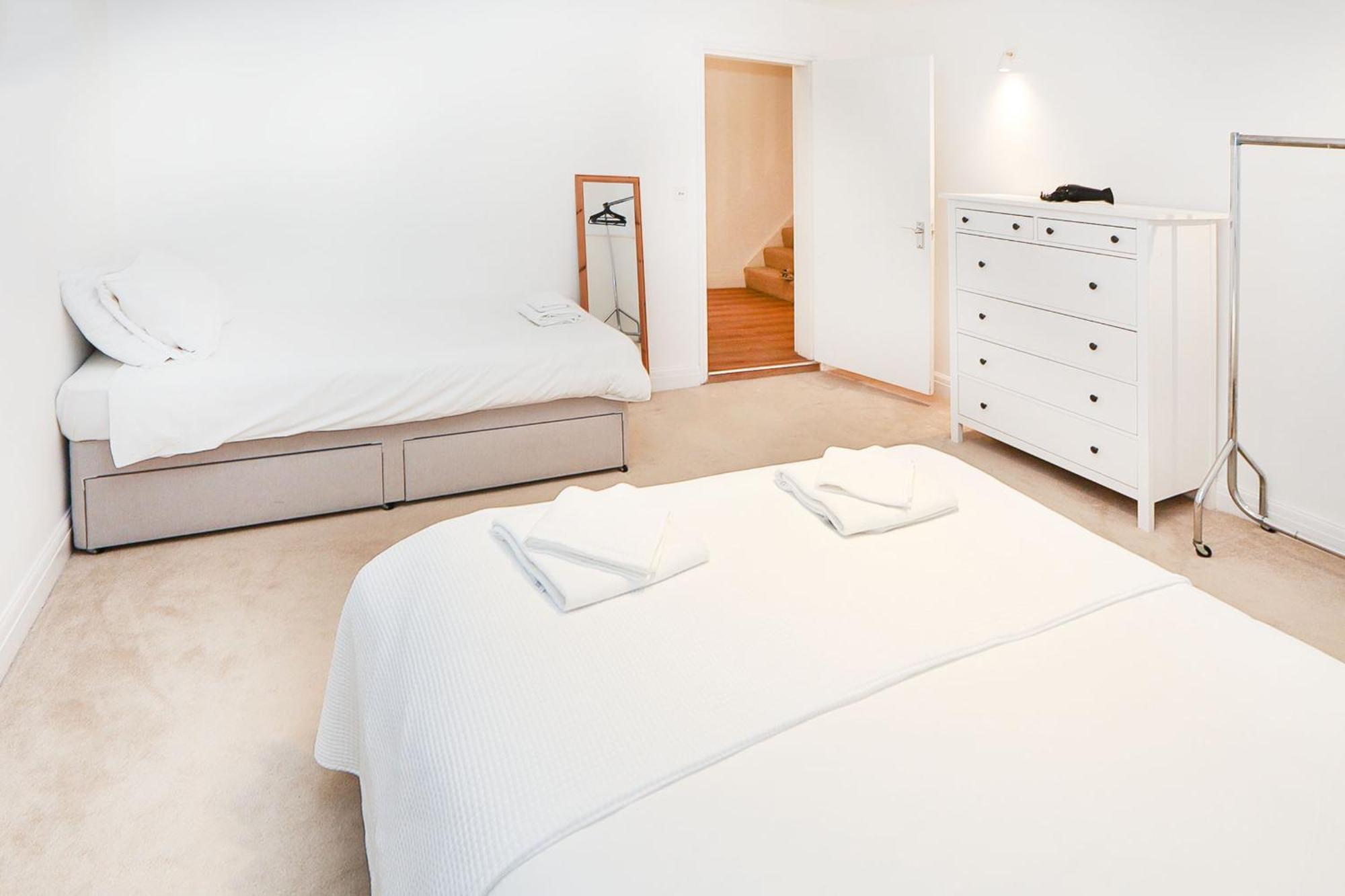 Elegant 2-bedroom Getaway W Terrace & Garden Views